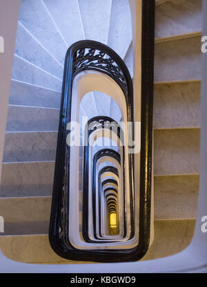 Abstract and vintage concept. Top view of spiral stairs and banister Stock Photo