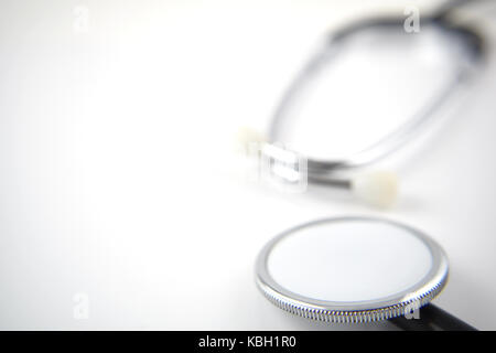 black and silver stethoscope isolated on a white background. Medical healthcare concept Stock Photo