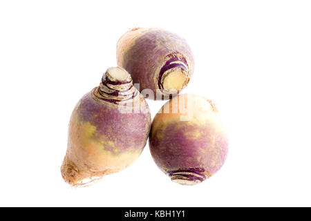 three Fresh Rutabaga root on the white Stock Photo