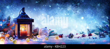 Snowy Lantern With Fir Branches And Baubles - Christmas Card Stock Photo