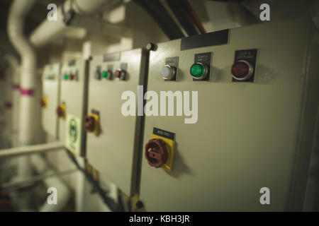 Close-up of button on engine control room in ship Stock Photo