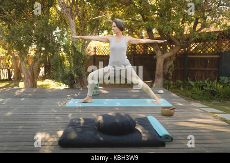 Senior woman exercising in park on a sunny day Stock Photo
