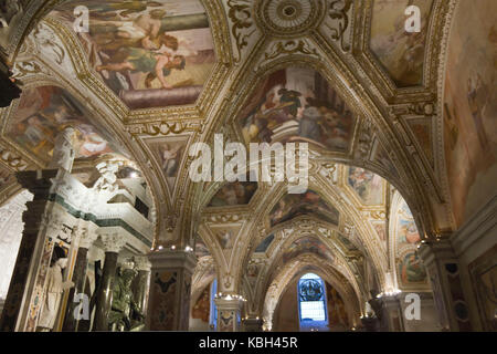 Amalfi, Italy, August 11, 2014: Amalfi Cathedral, Crypt of St. Andrew, where the saint's relics are kept in the central altar. The crypt is decorated  Stock Photo