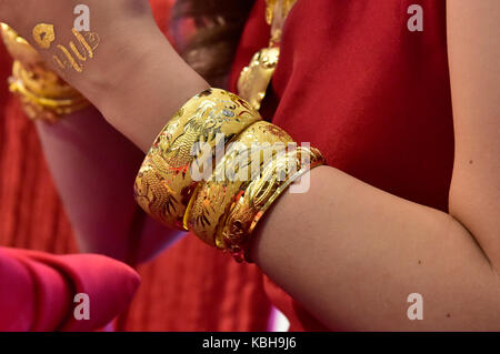 Traditional Chinese gold jewellery wedding gifts given to the bride, Hong Kong, China. Stock Photo