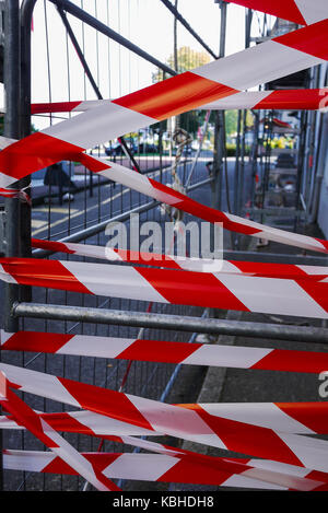 Red and white tape signalizes forbidden access to building work, Evian