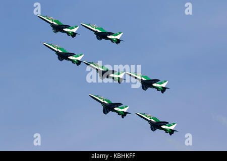 Saudi Air Force British Aerospace Hawk 65A, the Saudi Hawks, display over the sea off the East Coast of Malta. Stock Photo