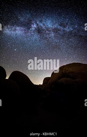 The night sky peppered with thousands of stars and the beautiful Milky ...