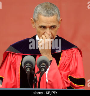 NEW BRUNSWICK, NJ - MAY 15: President Barack Obama receives honory degree from Rutgers President Robert Barchi and gives the commencement speech at Rutgers University's 250th anniversary on May 15, 2016 in New Brunswick, New Jersey.   People:  Barack Obama  Transmission Ref:  MNC1  Hoo-Me.com / MediaPunch Stock Photo