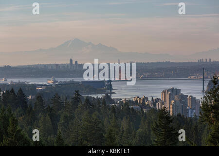 Port of Vancouver British Columbia Canada by Lions Gate Bridge with Mount Baker view in the morning Stock Photo