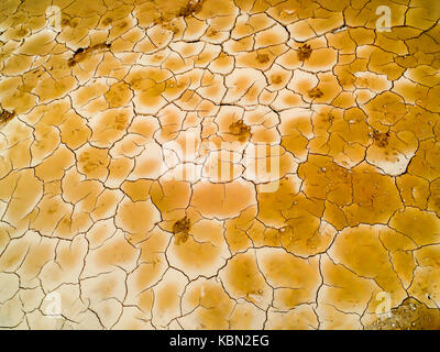 foot paints on dry dirt at swamp in summer no survival cause high temperature Stock Photo