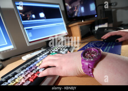 editor working on movie rushes Stock Photo