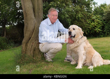Former Track & field athlete and Olympian David Hemery at his home in Wiltshire, with his dogs, alpacas and horses. Stock Photo