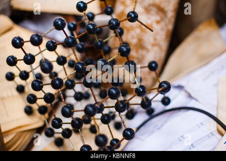 Old rusty square plastic model of molecule grid Stock Photo