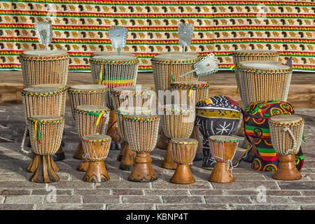 African handmade drums including African Ghana Shekere Drums (Shekere African Percussion instrument from Ghana. Also known as an Axatse). Stock Photo