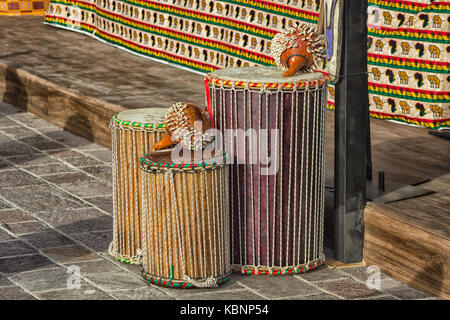 African handmade drums including African Ghana Shekere Drums (Shekere African Percussion instrument from Ghana. Also known as an Axatse). Stock Photo