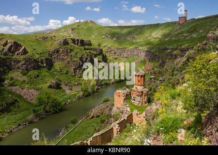 Abandoned Armenian church and a mosque in the ruins of the ancient capital of Bagradit Armenian Kingdom, Ani, in Kars, Turkey. Stock Photo