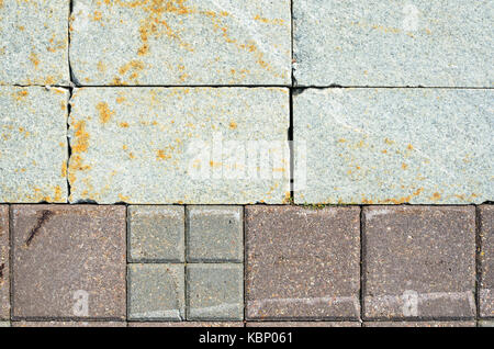 Pavement Tiles from Granite Stone. The Texture of Natural Stone in the Decoration of Street Spaces Stock Photo