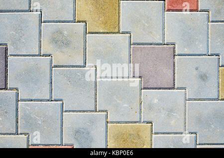 Multicolored Sidewalk Tile Texture. The Texture of Artificial Stone Pavers of Different Colors Stock Photo
