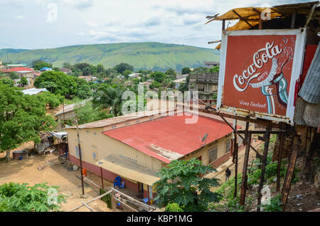 View over the Congolese river town Matadi with buildings and Coca Cola billboard, Democratic Republic of Congo, Africa Stock Photo