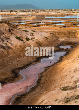 Sand, water and salt, landscape of salt mine water ponds in Santa Maria, Cape Verde Stock Photo