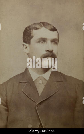 American archive monochrome studio portrait photograph of young man with moustache, named as Jacob Bennett, taken in late 19th century, USA Stock Photo