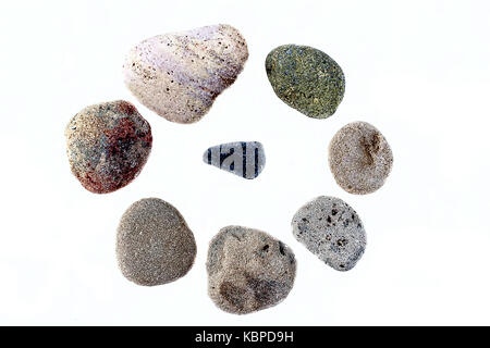 Sea pebbles forming a circle isolated on white. Stock Photo