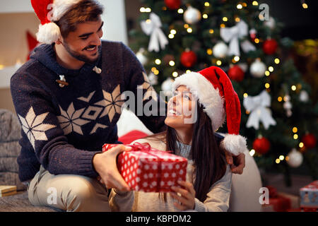 Christmas surprise for girlfriend on Christmas Eve Stock Photo