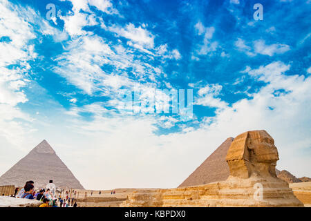 Admiring the sphinx in Cairo, Egypt Stock Photo