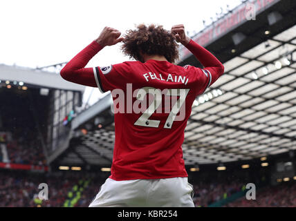 Manchester United's Marouane Fellaini celebrates scoring his side's second goal of the game during the Premier League match at Old Trafford, Manchester. Stock Photo