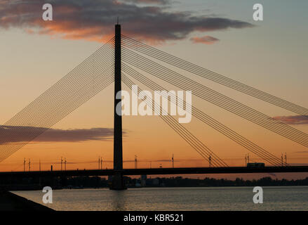 Riga, cable-stayed bridge at sunset Stock Photo