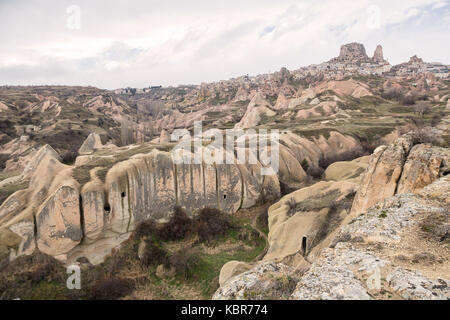 View of city and fortress Uchisar from the Pigeon Valley. Cappadocia, Turkey Stock Photo