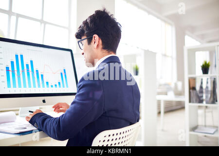 Analyzing financial statistics Stock Photo