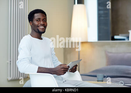 Smiling Freelancer Working from Home Stock Photo