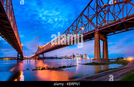 Skyline of New Orleans with Mississippi River at Dusk Stock Photo