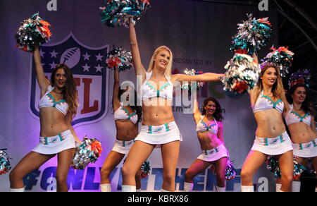 London, UK. 30th September, 2017. Miami Dolphins cheerleaders at NFL on Regent Street - the length of London's major Shopping street is closed to traffic all day as fan event takes over. Celebrating the following day's NFL game between Miami Dolphins v New Orleans Saints at Wembley Stadium. Players from both teams appear on stage as well as 'NFL Legends' , Cheerleaders and personalities, London September 30th 2017  Photo by Keith Mayhew/Alamy Live News Stock Photo