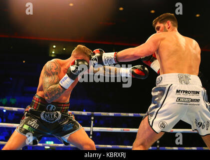 Liverpool, UK. 30th September, 2017. ROCKY FIELDING  (White Shorts) beats  DAVID BROPHY (Black Shorts) for the British and Commonwealth Super-Middleweight Championships on the Matchroom Boxings Battle on the Mersey show at Echo Arena, Liverpool Picture by Stephen Gaunt/Touchlinepics.com/Alamy Live News 30/09/2017 Credit: Stephen Gaunt/Alamy Live News Stock Photo