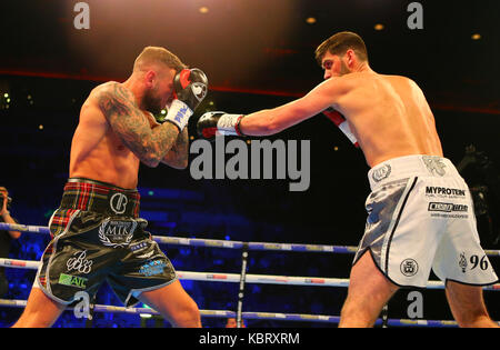 Liverpool, UK. 30th September, 2017. ROCKY FIELDING  (White Shorts) beats  DAVID BROPHY (Black Shorts) for the British and Commonwealth Super-Middleweight Championships on the Matchroom Boxings Battle on the Mersey show at Echo Arena, Liverpool Picture by Stephen Gaunt/Touchlinepics.com/Alamy Live News 30/09/2017 Credit: Stephen Gaunt/Alamy Live News Stock Photo