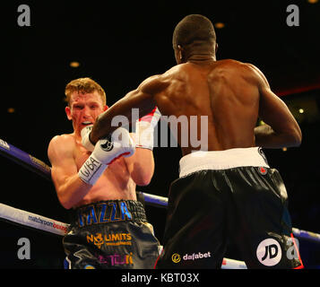 Liverpool, UK. 30th Sep, 2017. TOM FARRELL (Grey/White/Blue Shorts) loses to OHARA DAVIES (Black and White Shorts) for WBA International Super-Lightweight Championship Tittle at the Matchroom Boxings Battle on the Mersey at Echo Arena, Liverpool Picture by Credit: Stephen Gaunt/Alamy Live News Stock Photo