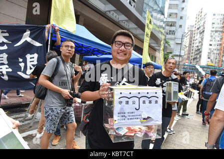 Hong Kong. 1st October, 2017. Money collections are at every point of the rally to build funds for ongoing legal battles faced by the pro-democracy activists.Hong Kong's 68th National Day is marked by a mass rally. Various political parties called for the rally in light of recent suppression of those speaking out against what they see as the disintegration of the Basic Law and the 'one country, two systems'' .Dubbed as the 'Anti-authoritarian rally-No more political Suppression. Credit: ZUMA Press, Inc./Alamy Live News Stock Photo