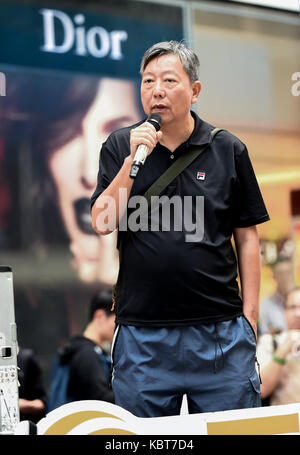 Hong Kong. 1st October, 2017. Lee Cheuk-yan shouts in support as the crowd passes. Hong Kong's 68th National Day is marked by a mass rally. Various political parties called for the rally in light of recent suppression of those speaking out against what they see as the disintegration of the Basic Law and the 'one country, two systems'' .Dubbed as the 'Anti-authoritarian rally-No more political Suppression. Credit: ZUMA Press, Inc./Alamy Live News Stock Photo