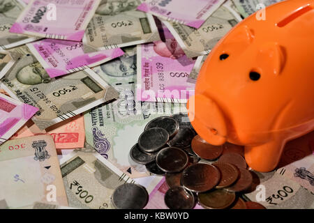 Saving Indian Currency In Piggy Bank Stock Photo 162202055 Alamy