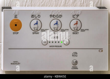 Closeup of a Japanese toilet control panel in a business hotel in Japan Stock Photo