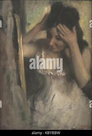 'Woman Combing her Hair before a Mirror' by Edgar Degas Stock Photo
