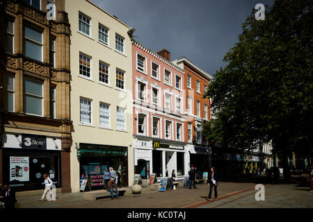 St Anns Square pedestrianised shopping are in Manchester City centre  housing large chain stores Three mobile Holland and barrett and McDonalds restau Stock Photo