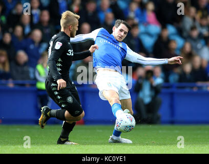 Sheffield Wednesday's Kieran Lee (right) and Leeds United's Samuel Saiz battle for the ball during the Sky Bet Championship match at Hillsborough, Sheffield. Stock Photo