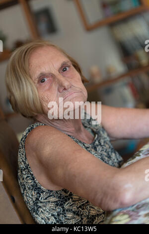 Woman of elder age at home Stock Photo