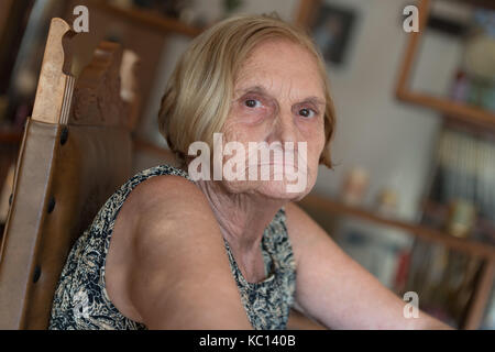 Woman of elder age at home Stock Photo