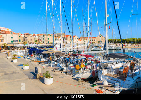 PRIMOSTEN, CROATIA - SEP 4, 2017: sailing boats anchoring in port of Primosten, Dalmatia, Croatia. Stock Photo