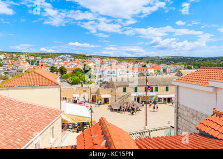 PRIMOSTEN, CROATIA - SEP 5, 2017: View of Primosten old town square from red tile roof top, Dalmatia, Croatia Stock Photo