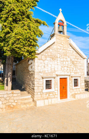 Small church in Primosten town park, Dalmatia, Croatia Stock Photo